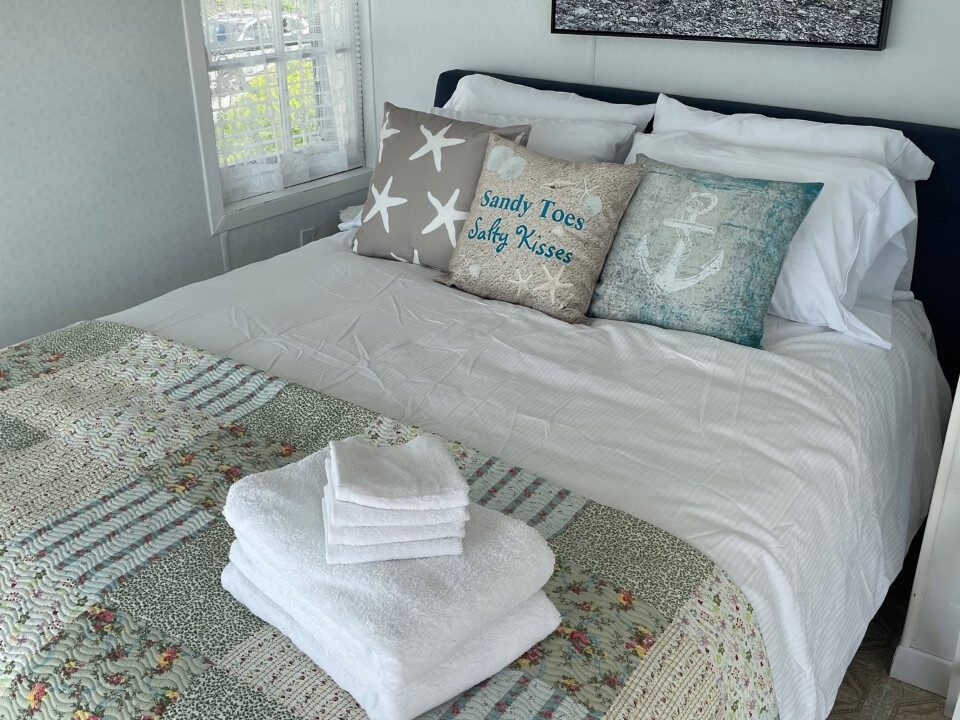 Chambre principale Le 87 au FLEUVE lit QUEEN